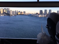 a view of a city from the window of a bus